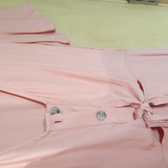 Gorgeous peach button up midi dress with midriff cutout. - Picture 2 of 4